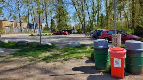 The gravel parking lot at burnaby fraser foreshore off-leash dog park