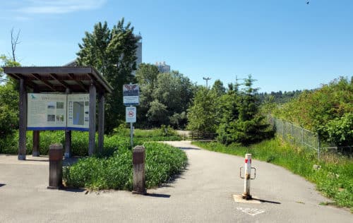 A picture of the park entrance from the parking lot at harbourview off-leash dog park, north vancouver, bc
