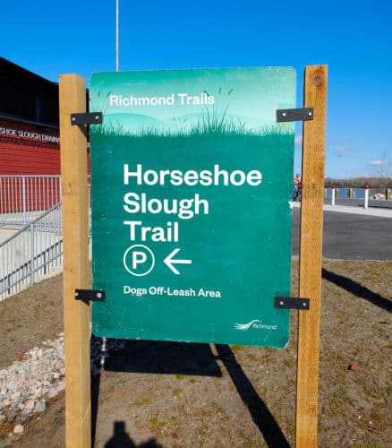 A picture of the trail sign for horseshoe slough trail in richmond, bc