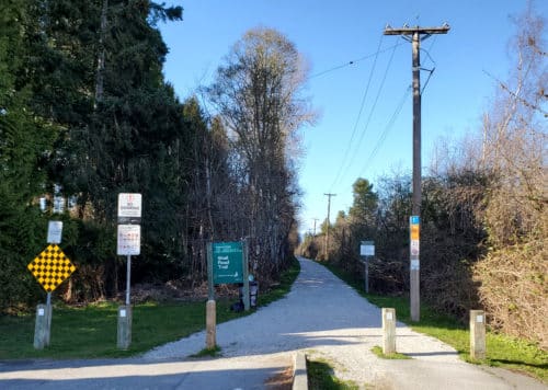 A picture of the entrance to the shell road off-leash trail in richmond, bc