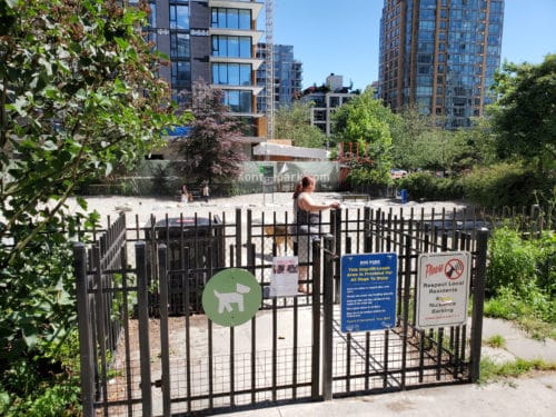 Double gated entry into emery barnes park off-leash dog park, vancouver, bc