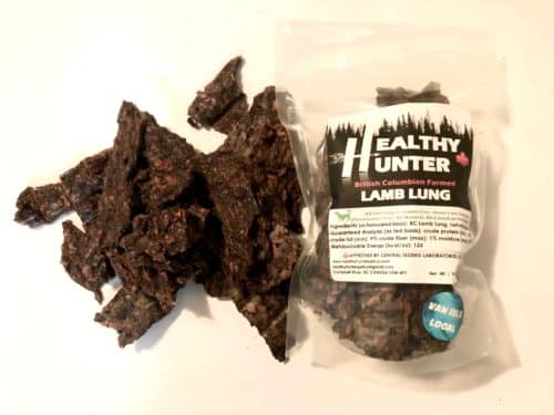 A bag of healthy hunter lamb treats with treats spilling out of the bag